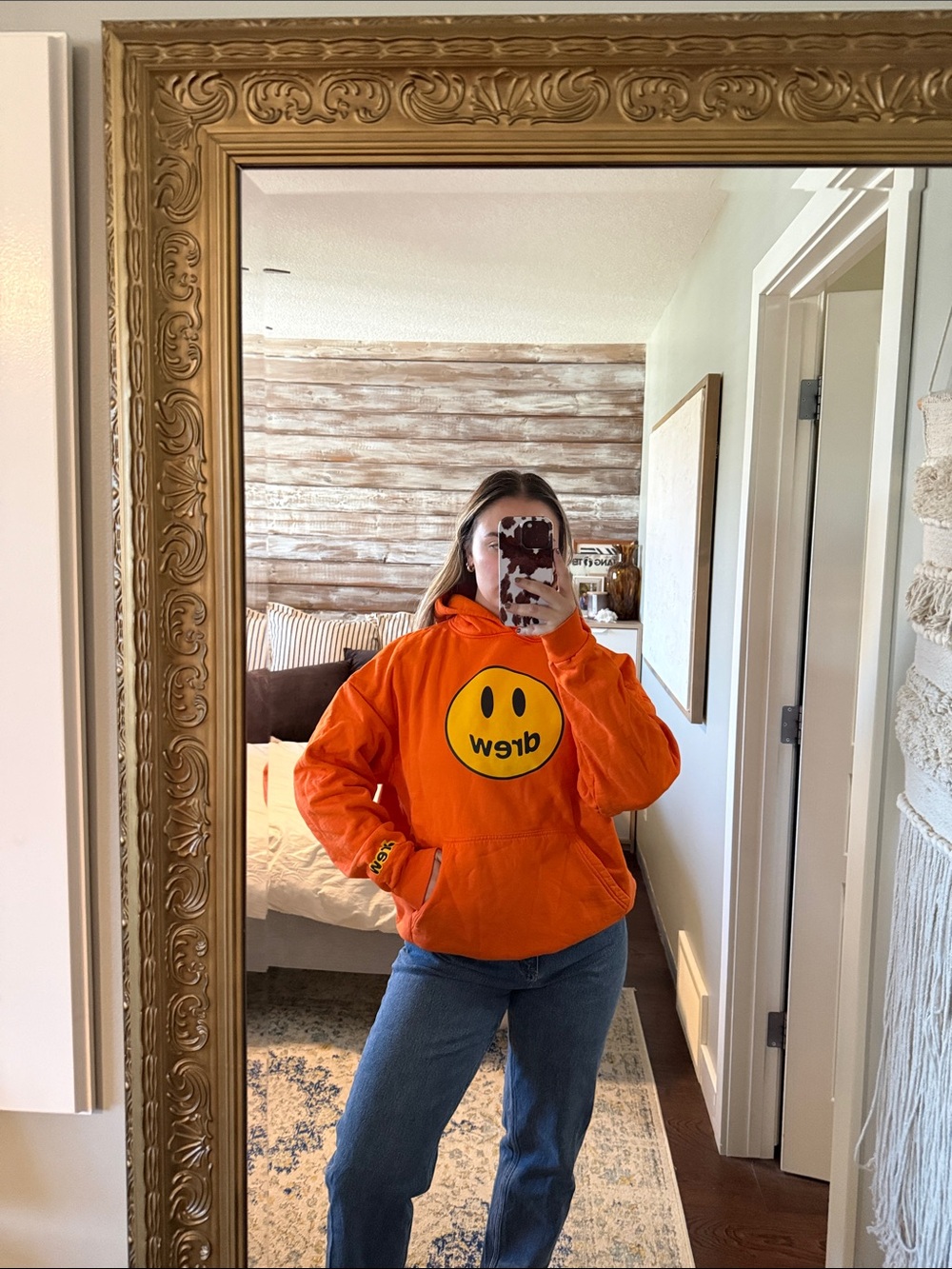 drew House Orange Crewneck Hoodie with Yellow Smiley Logo